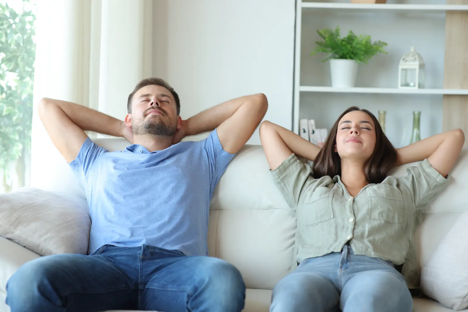 Happy couple enjoying air conditioned home w1600